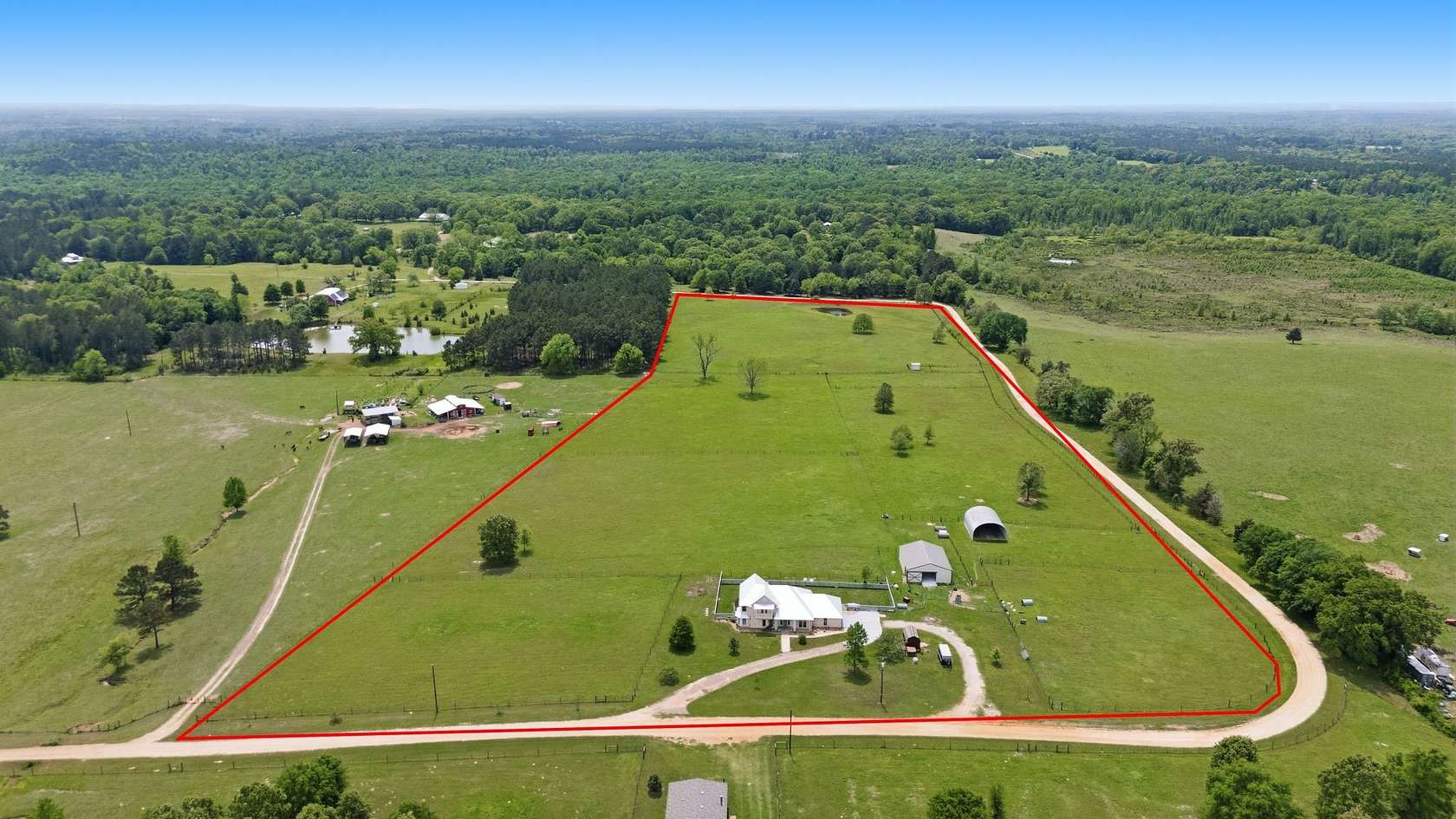 25.8 Acres of Agricultural Land with Home for Sale in Troup, Texas