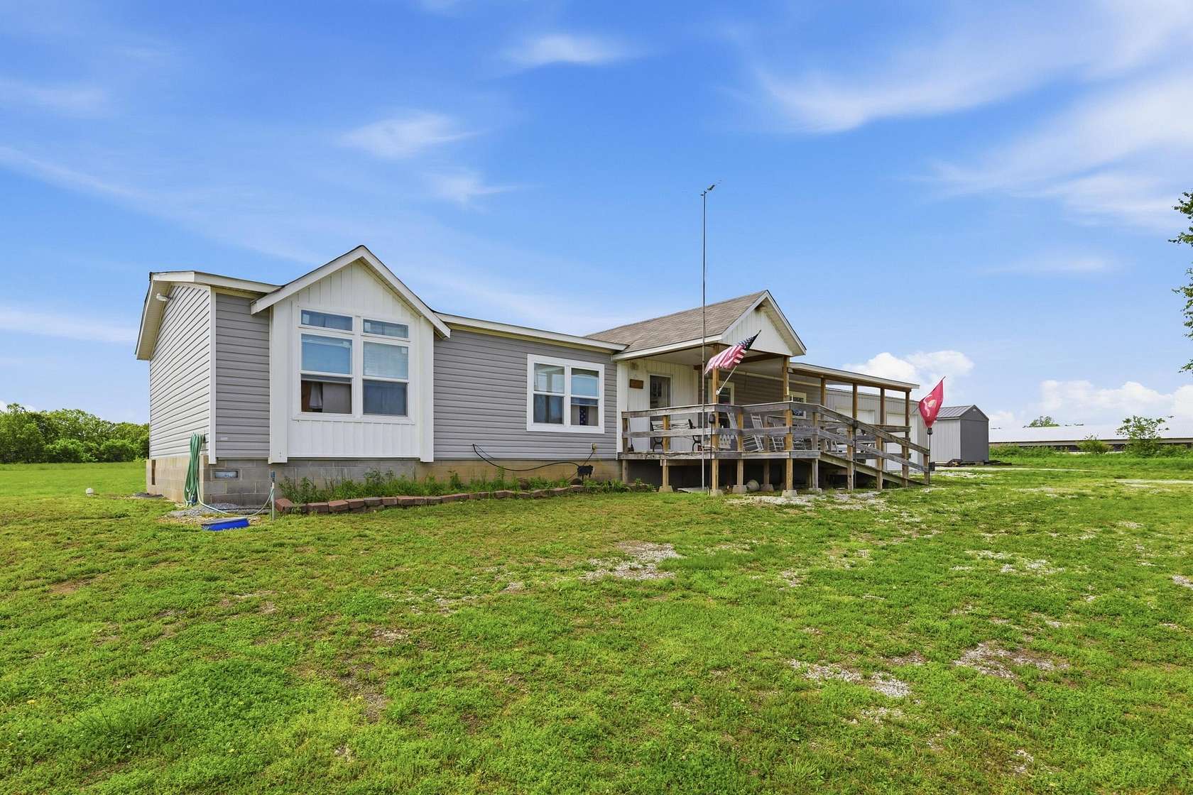 9.86 Acres of Land with Home for Sale in Stella, Missouri