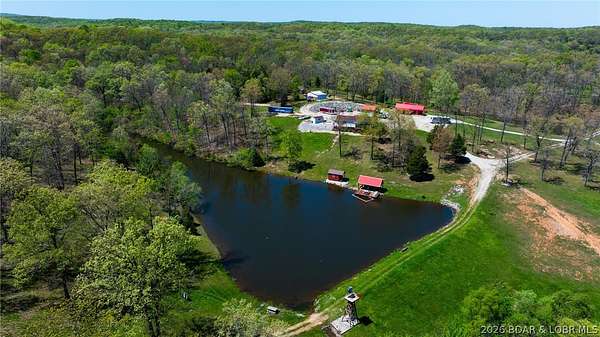 221 Acres of Land with Home for Sale in Versailles, Missouri