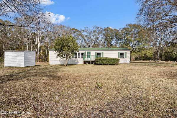 6.39 Acres of Land with Home for Sale in Callahan, Florida