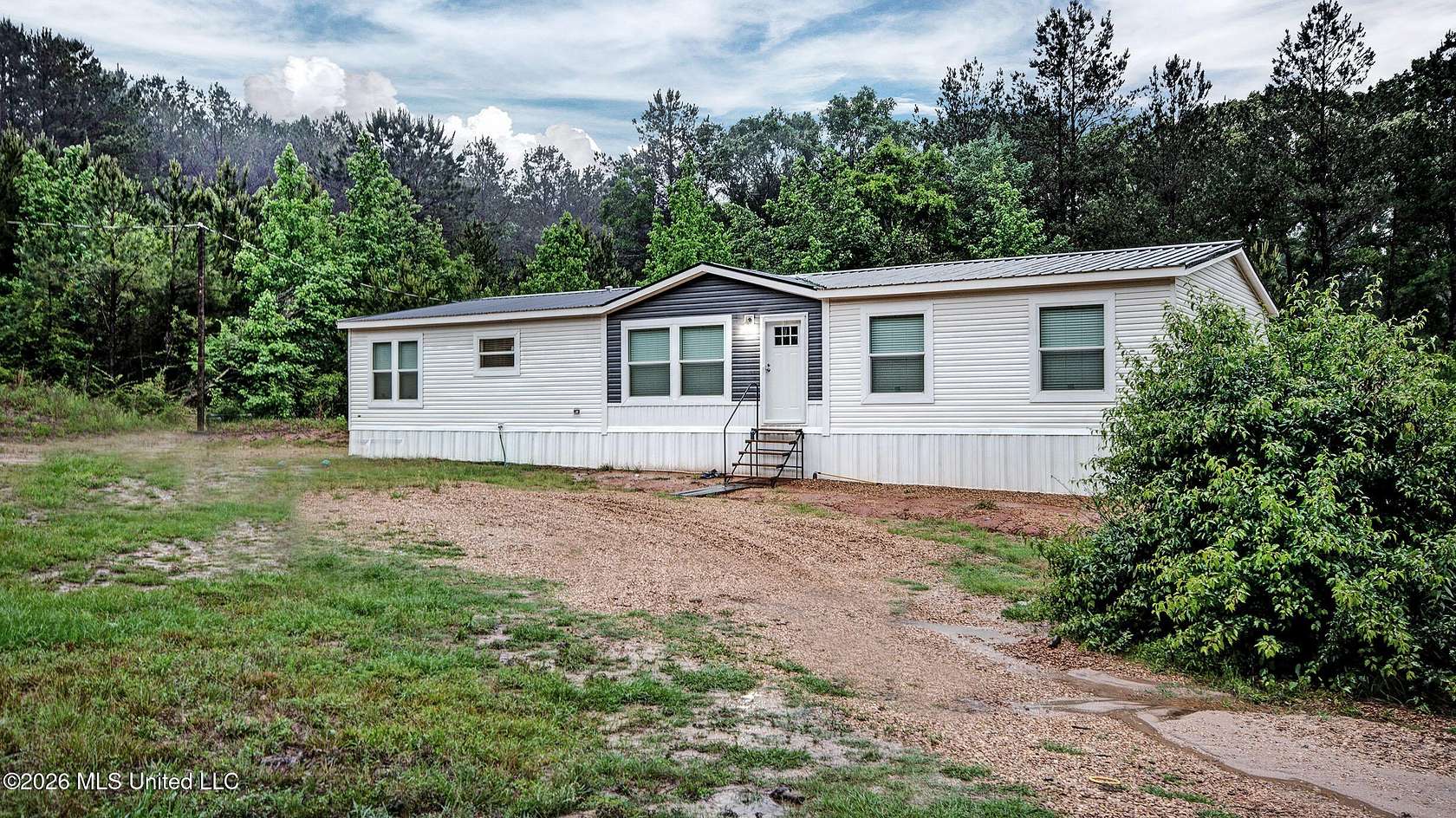 6 Acres of Land with Home for Sale in Mendenhall, Mississippi