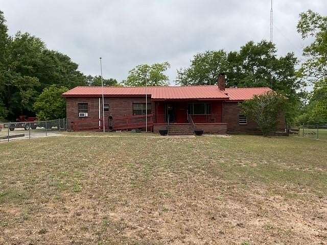 9.6 Acres of Land with Home for Sale in Highland Home, Alabama