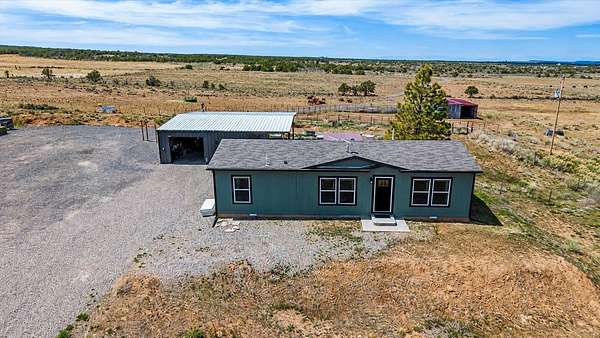 61 Acres of Land with Home for Sale in Glade Park, Colorado