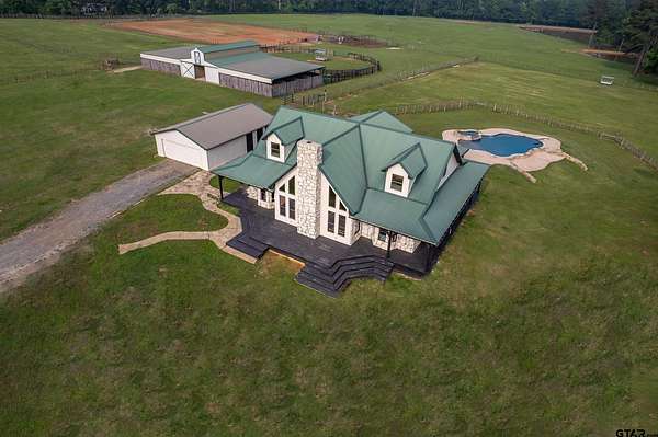 35.4 Acres of Agricultural Land with Home for Sale in Troup, Texas