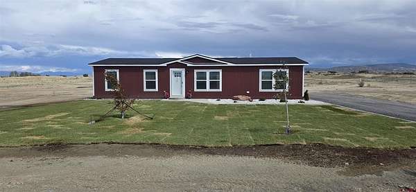2.45 Acres of Land with Home for Sale in Delta, Colorado