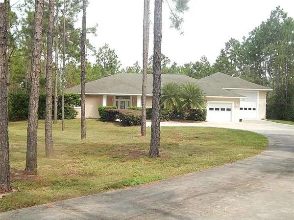 1.78 Acres of Land with Home for Auction in Highland Park, Florida
