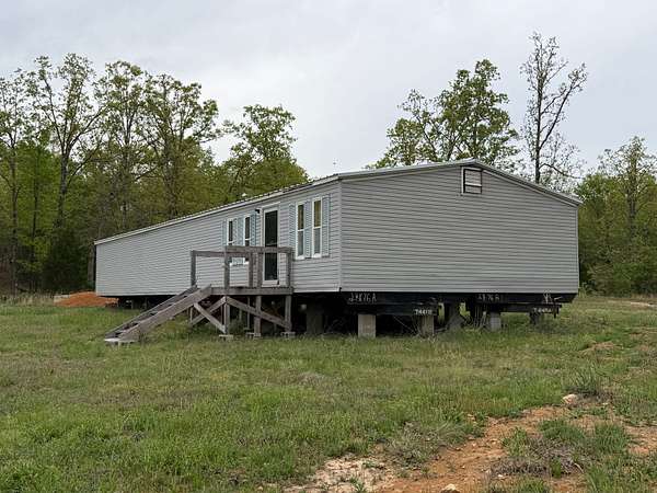 5 Acres of Land with Home for Sale in Ash Flat, Arkansas