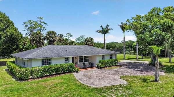 2 Acres of Land with Home for Sale in Loxahatchee Groves, Florida