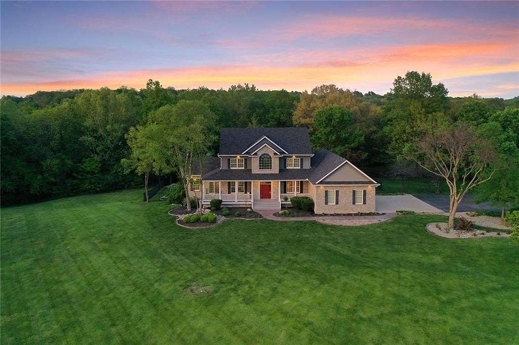 10 Acres of Recreational Land with Home for Sale in Oak Grove, Missouri
