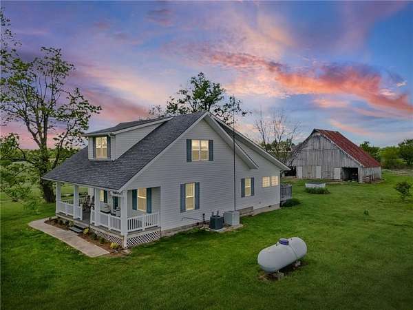 8.77 Acres of Land with Home for Sale in Warrensburg, Missouri