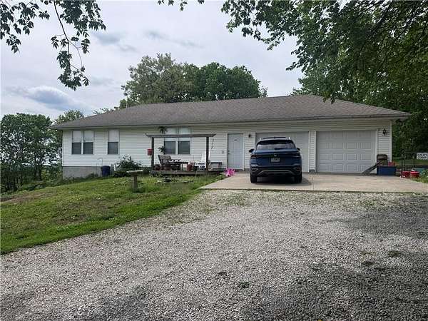 9 Acres of Land with Home for Sale in Grain Valley, Missouri