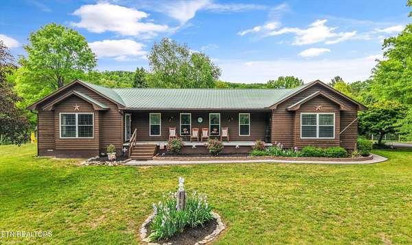8.14 Acres of Land with Home for Sale in Washburn, Tennessee