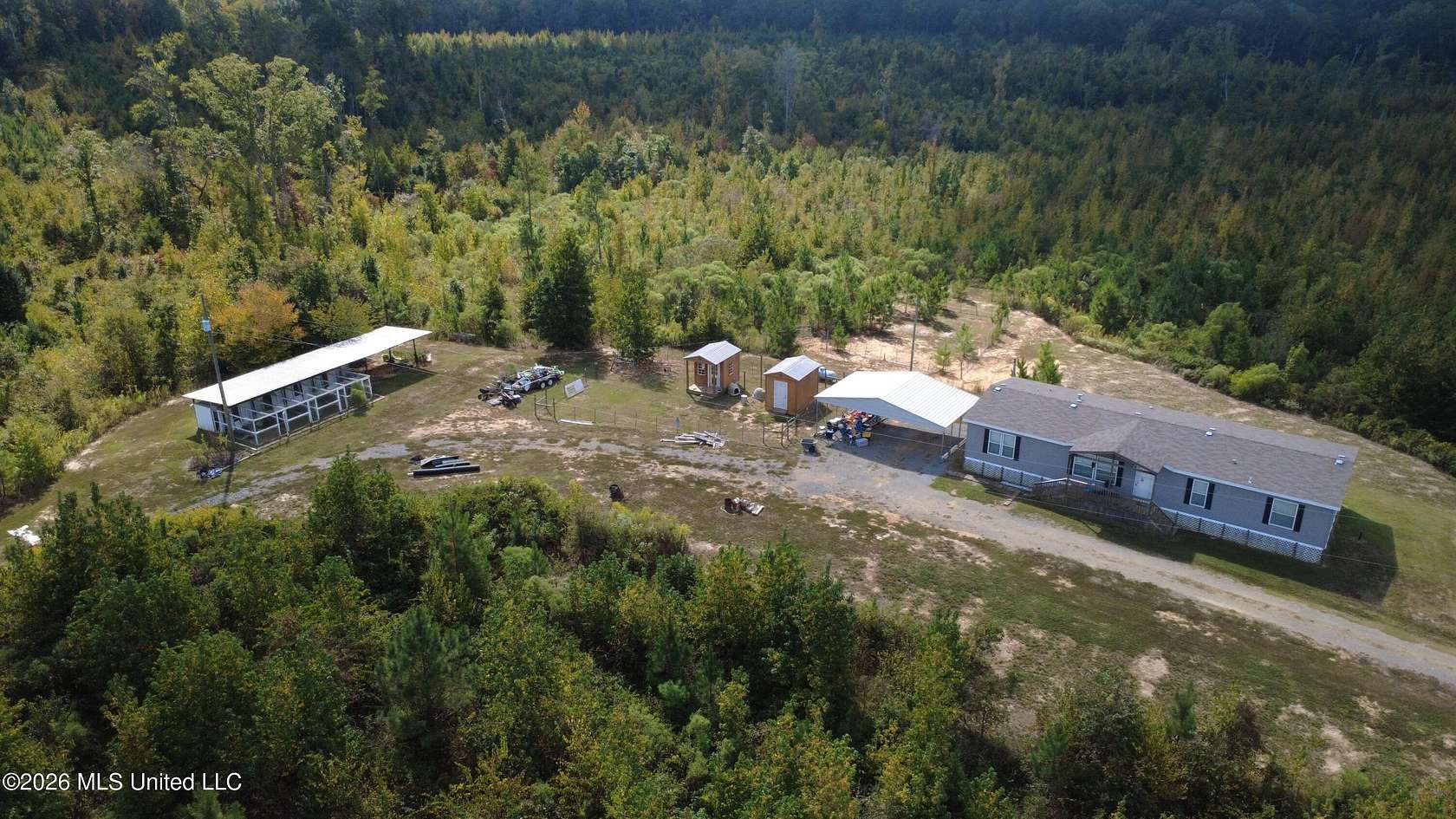100 Acres of Recreational Land with Home for Sale in Kosciusko, Mississippi