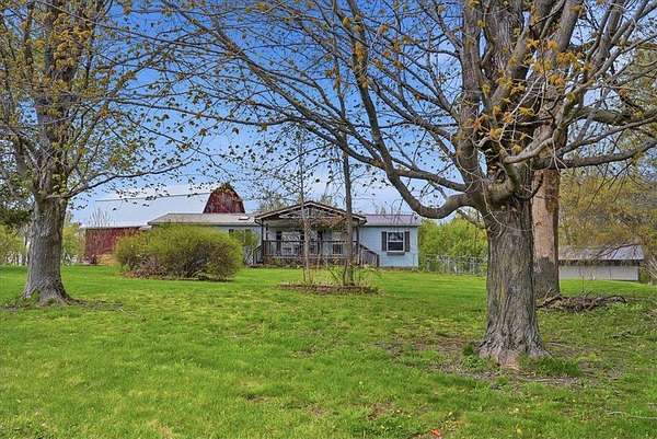 10 Acres of Land with Home for Sale in Hartland Town, Wisconsin