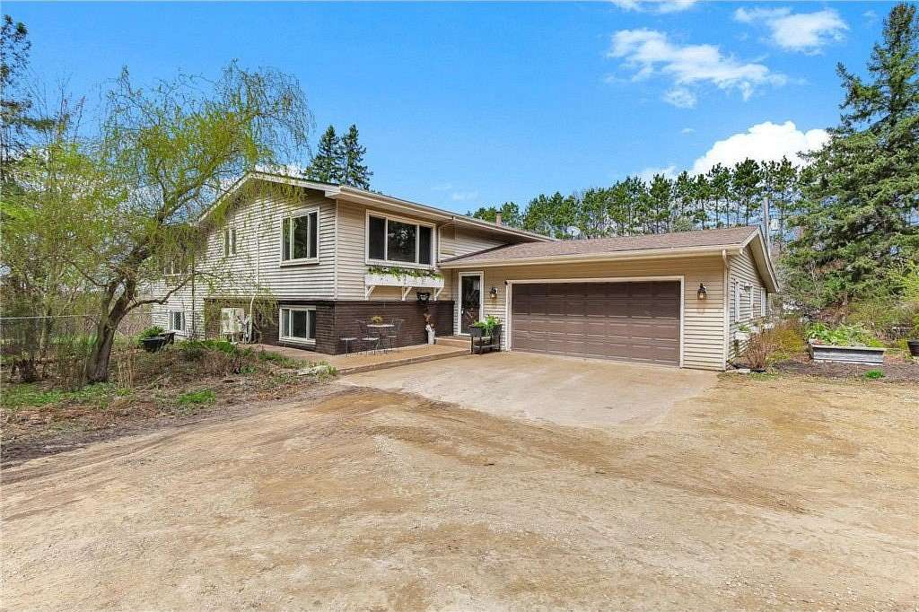 4.84 Acres of Land with Home for Sale in Wyoming, Minnesota