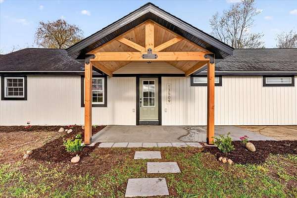 3 Acres of Land with Home for Sale in Sand Lake, Michigan