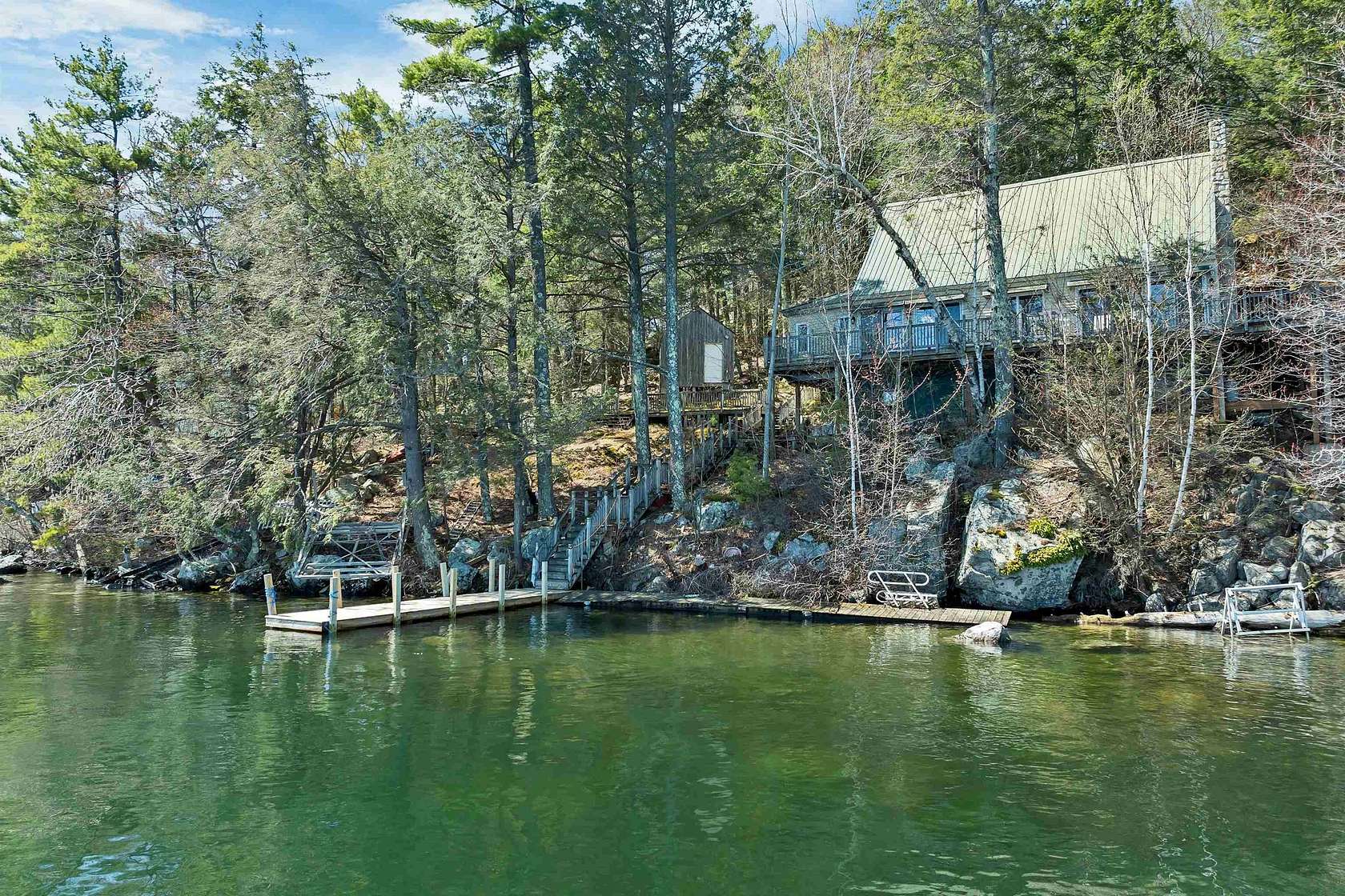 1.5 Acres of Land with Home for Sale in Alton, New Hampshire