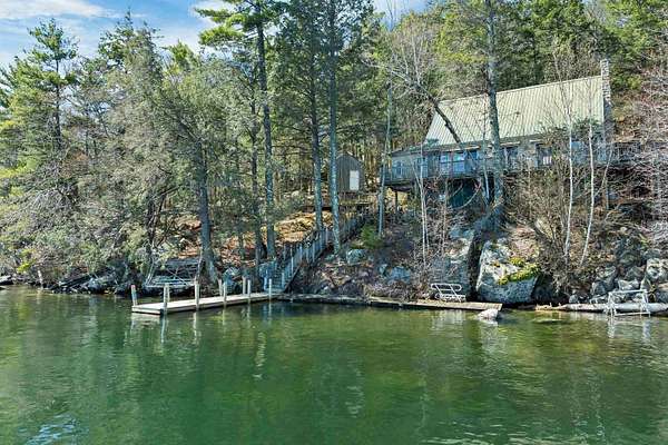 1.5 Acres of Land with Home for Sale in Alton, New Hampshire