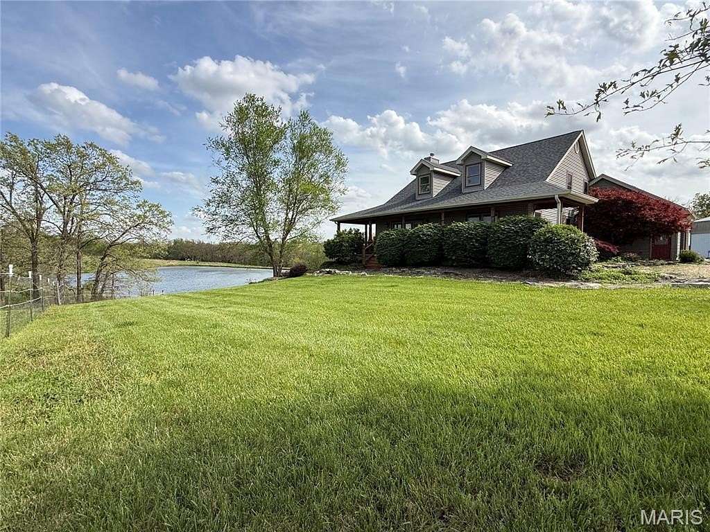 52 Acres of Land with Home for Sale in Bellflower, Missouri