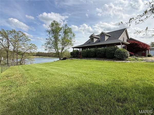 52 Acres of Land with Home for Sale in Bellflower, Missouri