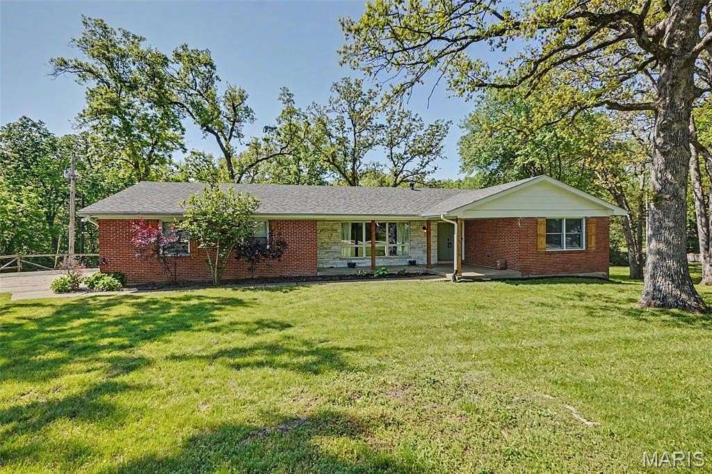 5 Acres of Land with Home for Sale in St. Paul, Missouri