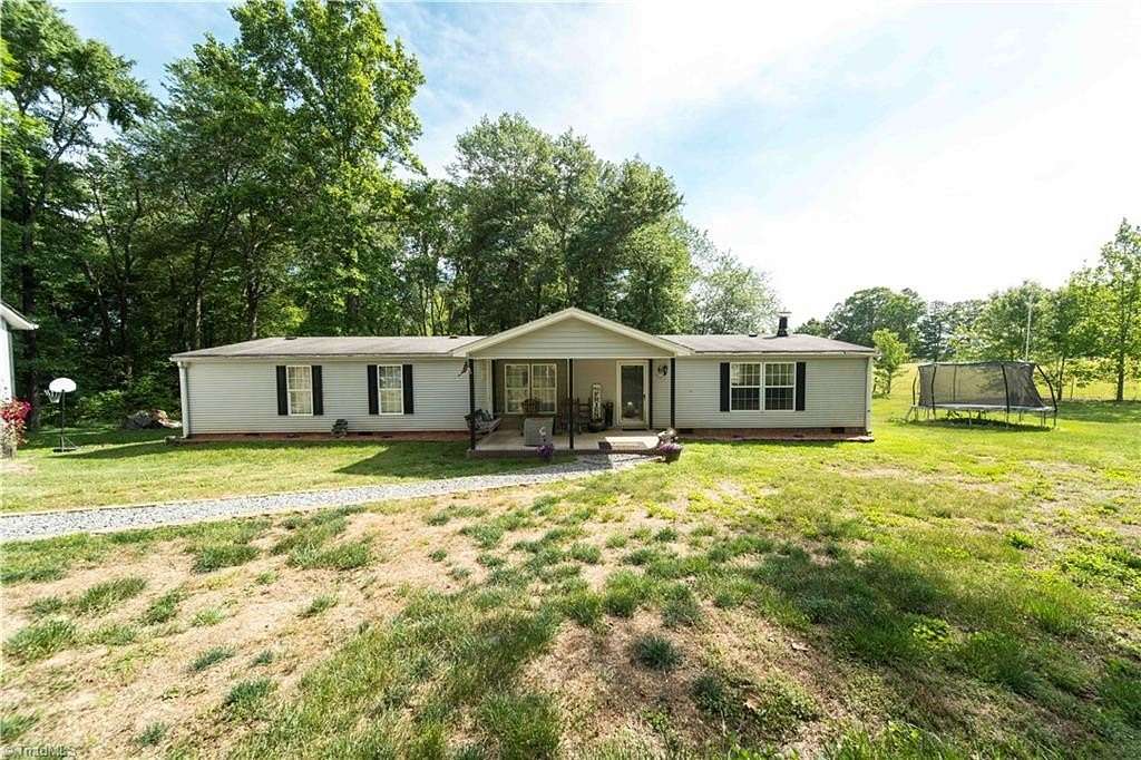 2.55 Acres of Land with Home for Sale in Hamptonville, North Carolina