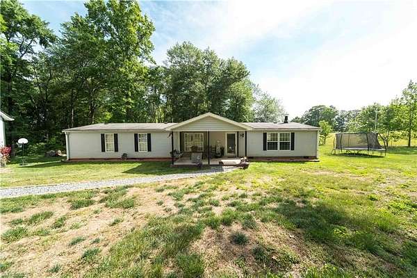 2.55 Acres of Land with Home for Sale in Hamptonville, North Carolina