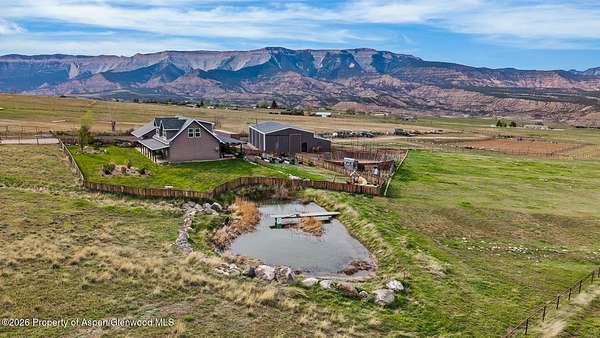 40 Acres of Agricultural Land with Home for Sale in Rifle, Colorado