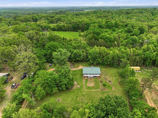 8.2 Acres of Land with Home for Sale in Mountain View, Missouri