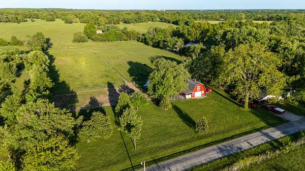 4.84 Acres of Land with Home for Sale in Miller, Missouri