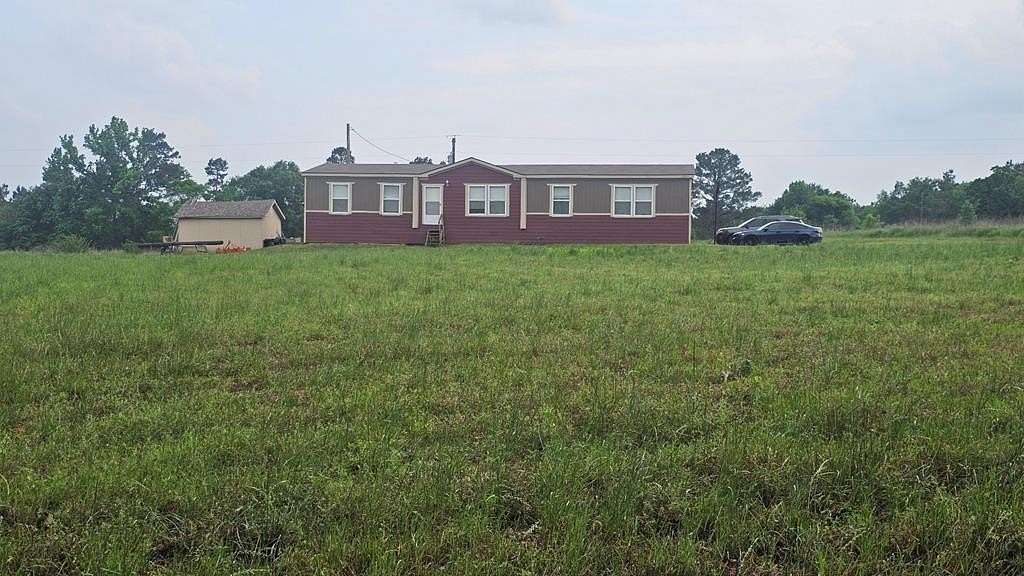 3.2 Acres of Land with Home for Sale in Garrison, Texas