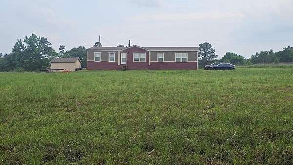 3.2 Acres of Land with Home for Sale in Garrison, Texas