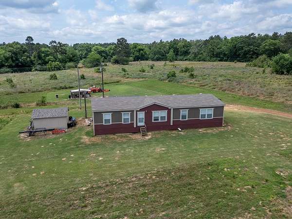 3.2 Acres of Land with Home for Sale in Garrison, Texas