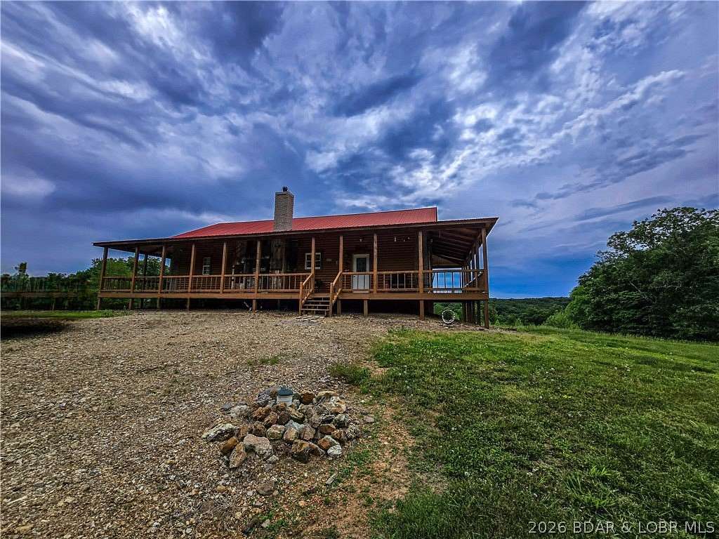 94 Acres of Recreational Land with Home for Sale in Stover, Missouri