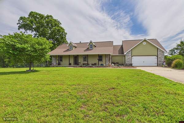 21.7 Acres of Agricultural Land with Home for Sale in Mountain Home, Arkansas