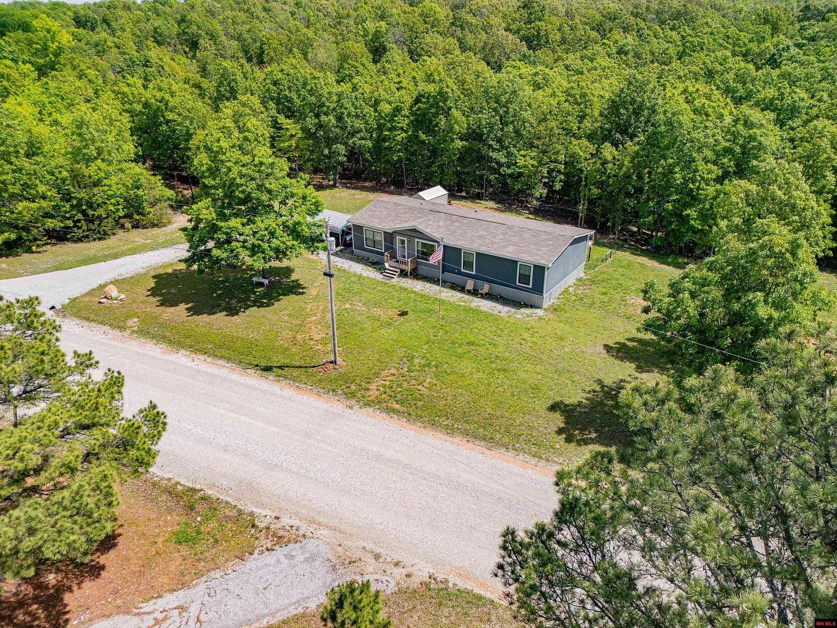 5 Acres of Land with Home for Sale in Valley Springs, Arkansas