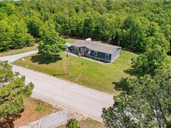 5 Acres of Land with Home for Sale in Yellville, Arkansas