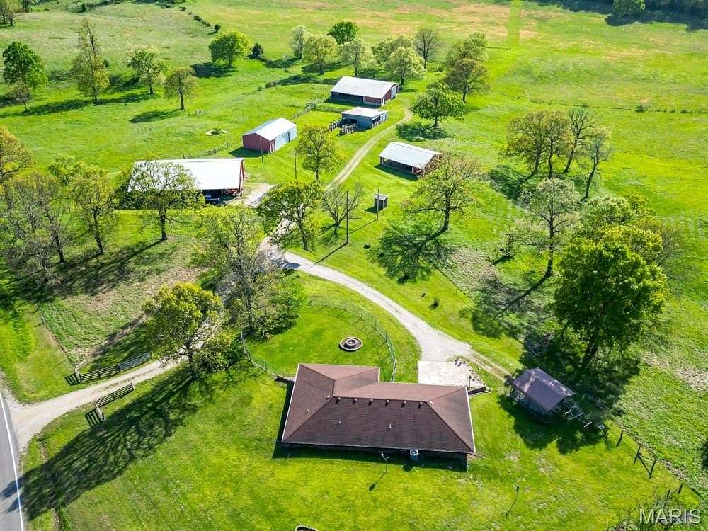76.2 Acres of Land with Home for Sale in Laquey, Missouri
