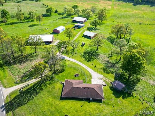 76.2 Acres of Land with Home for Sale in Laquey, Missouri