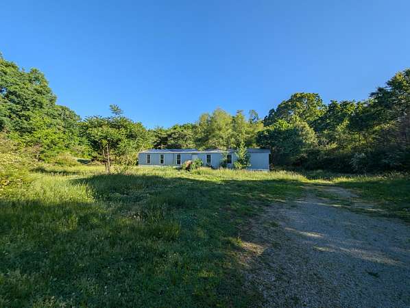 0.94 Acres of Mixed-Use Land for Sale in Bon Aqua, Tennessee