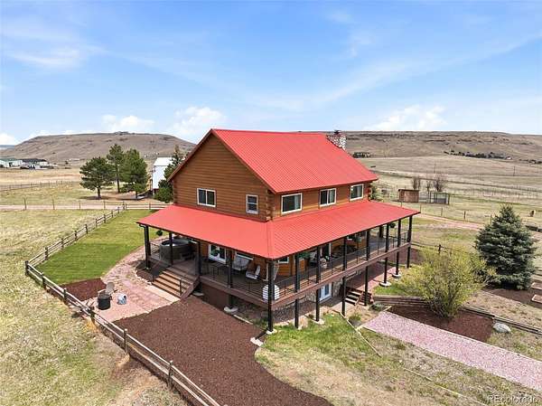 9.56 Acres of Land with Home for Sale in Larkspur, Colorado