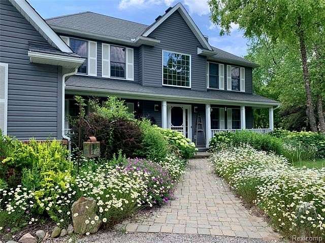 2.3 Acres of Land with Home for Sale in Genoa Township, Michigan