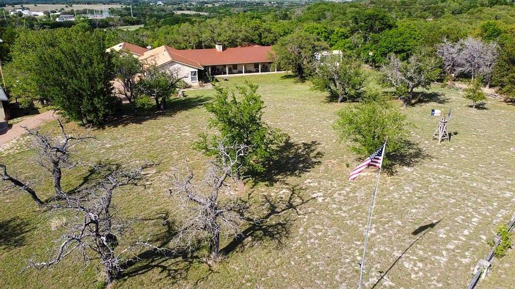 54.9 Acres of Agricultural Land with Home for Sale in Hamilton, Texas