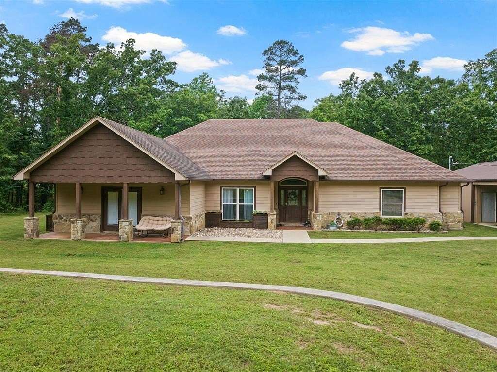 10.1 Acres of Land with Home for Sale in Avinger, Texas