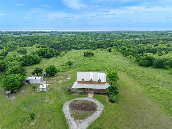 144 Acres of Land with Home for Sale in Ennis, Texas