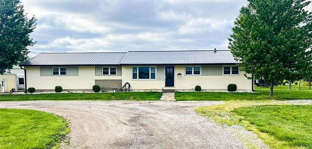 76 Acres of Land with Home for Sale in Tollesboro, Kentucky