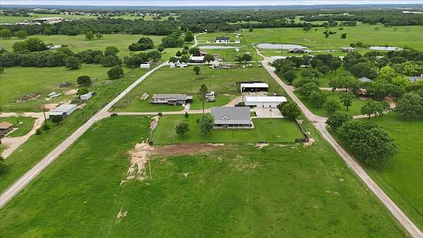 9.79 Acres of Land with Home for Sale in Paradise, Texas