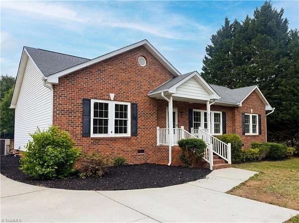 1.5 Acres of Land with Home for Sale in Stokesdale, North Carolina