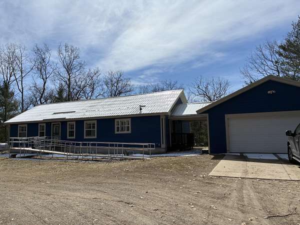 10.3 Acres of Recreational Land with Home for Sale in Baldwin, Michigan
