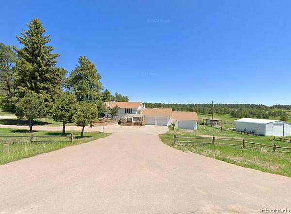 5.9 Acres of Land with Home for Sale in Larkspur, Colorado